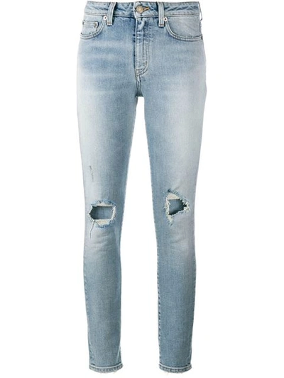 Shop Saint Laurent Skinny Distressed Jeans