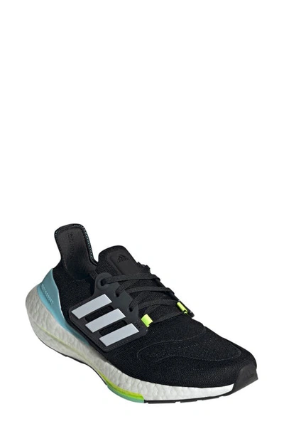 Shop Adidas Originals Ultraboost 22 Running Shoe In Black/ White/ Solar Yellow