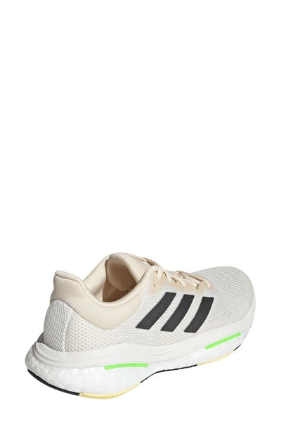 Shop Adidas Originals Solar Glide 5 Running Shoe In Ecru/ Carbon/ Green