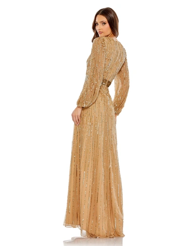 Shop Mac Duggal Sequined Wrap Over Puff Sleeve Gown In Gold