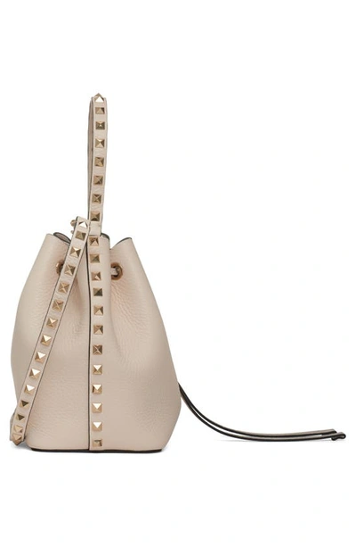 Shop Valentino Rockstud Leather Bucket Bag In I16 Light Ivory