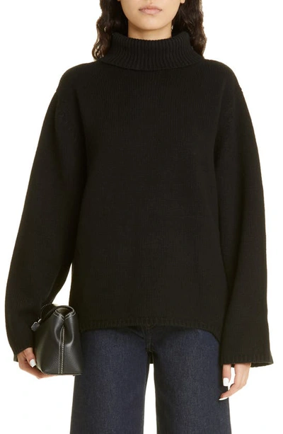 Shop Totême Oversize Wool & Cashmere Turtleneck Sweater In Black