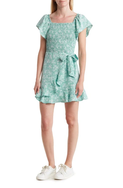 Shop Melrose And Market Floral Flutter Sleeve Smocked Fit & Flare Dress In Green Floral