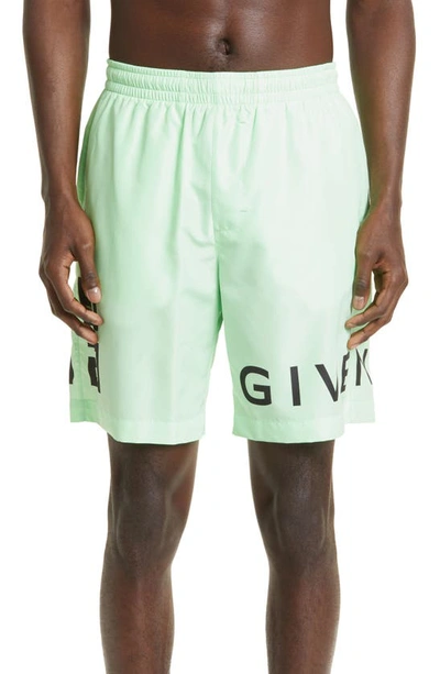 Shop Givenchy Logo Swim Trunks In Mint Green