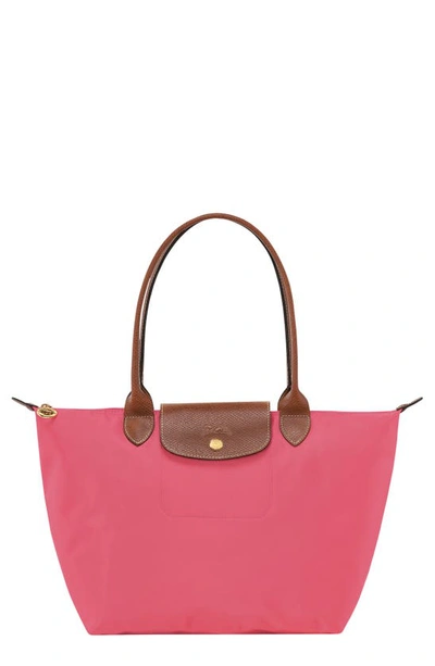 Shop Longchamp Small Le Pliage Shoulder Tote In Grenadine