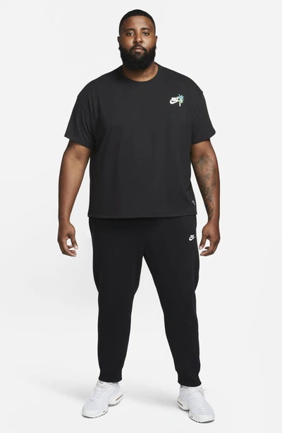 Shop Nike Beach Party Cotton Graphic T-shirt In Black