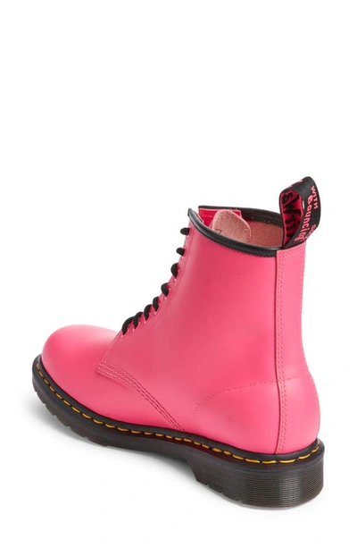 Shop Dr. Martens' 1460 Boot In Clash Pink Smooth