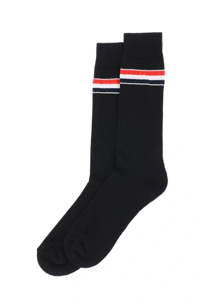 Shop Thom Browne Mid Calf Socks With Stripe Detail
