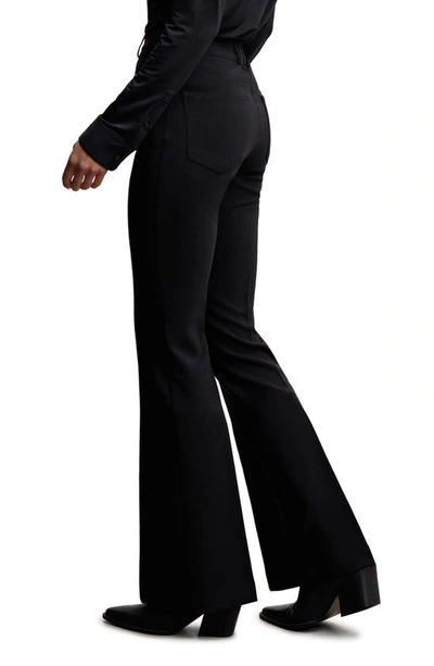 Shop Mango Pleated Flare Trousers In Black