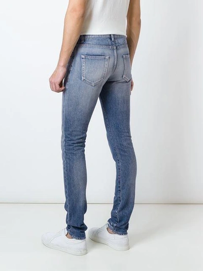 Shop Saint Laurent Low Waist Skinny Jeans