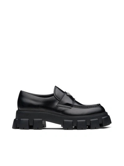 Shop Prada Monolith Brushed Leather Loafers In Black