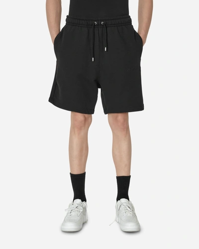 Shop Nike Wordmark Fleece Shorts In Black