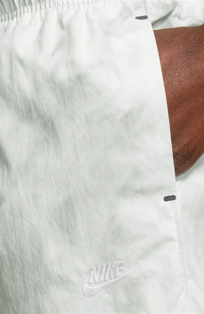 Shop Nike Sportswear Tech Pack Nylon Shorts In Light Silver/ White