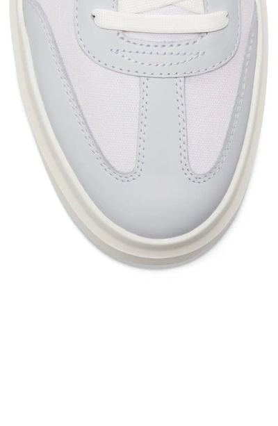Shop Cole Haan Grandpro Rally Sneaker In White/ Egret
