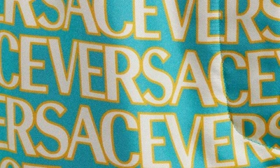 Shop Versace Logomania Print Silk Shorts In 5v550 Turquoise Avory