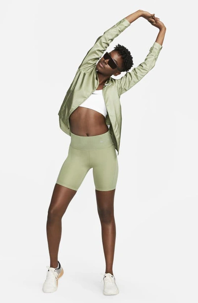 Shop Nike Dri-fit Tight Running Shorts In Oil Green