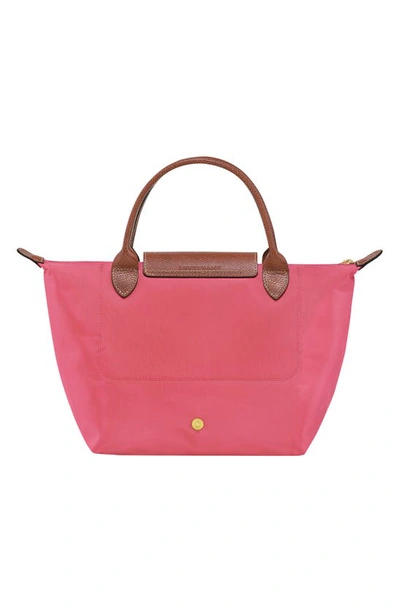 Shop Longchamp Small Le Pliage Recycled Canvas Top Handle Bag In Grenadine