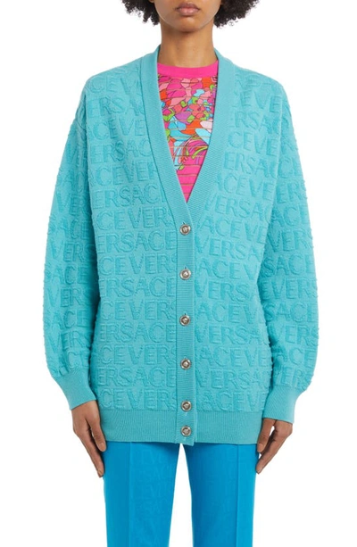 Shop Versace Oversize Logo Jacquard V-neck Virgin Wool Cardigan In 1vb60 Azur