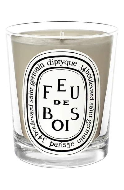 Shop Diptyque Feu De Bois (fire Wood) Scented Candle, 2.4 oz In Clear Vessel