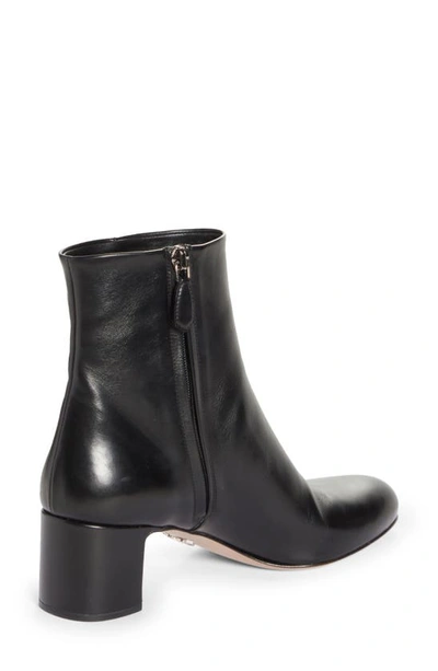 Shop Prada Logo Block Heel Bootie In Black