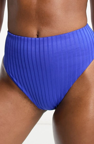 Shop Asos Design Ribbed High Cut High Waist Bikini Bottoms In Medium Blue
