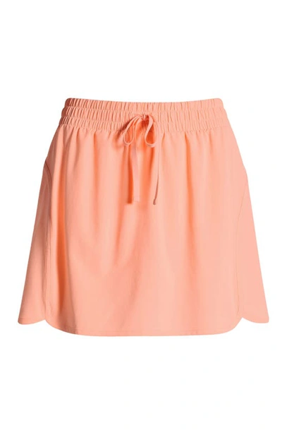 Beyond Yoga In Stride Lined Skort In Electric Peach