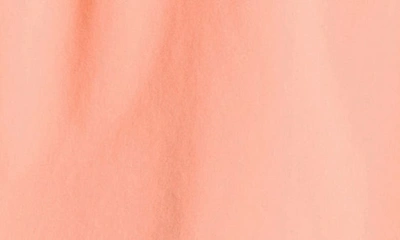 Beyond Yoga In Stride Lined Skort In Electric Peach