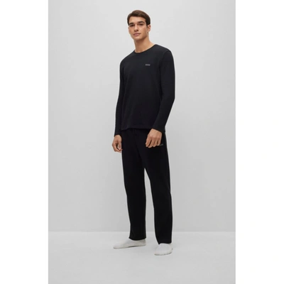 Shop Hugo Boss Waffle Cotton-blend Pajama Bottoms With Logo Embroidery In Black