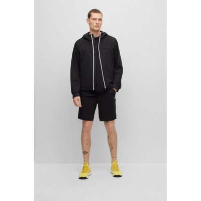 Shop Hugo Boss Water-repellent Jacket With Multicolored Logo Print In Black
