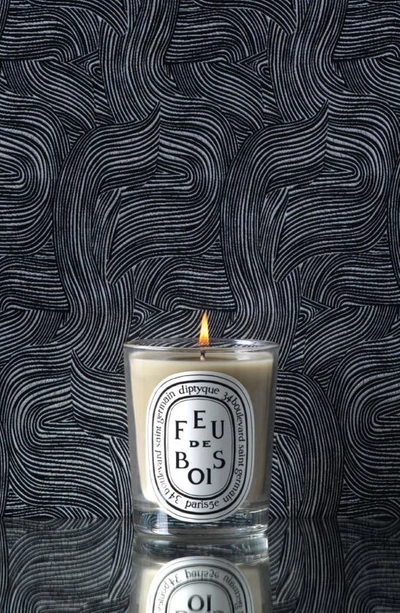 Shop Diptyque Feu De Bois (fire Wood) Scented Candle, 6.5 oz In Clear Vessel