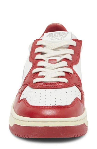 Shop Autry Medalist Low Sneaker In White/red