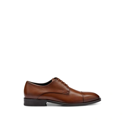 Shop Hugo Boss Leather Derby Lace-up Shoes With Embossed Logo In Brown
