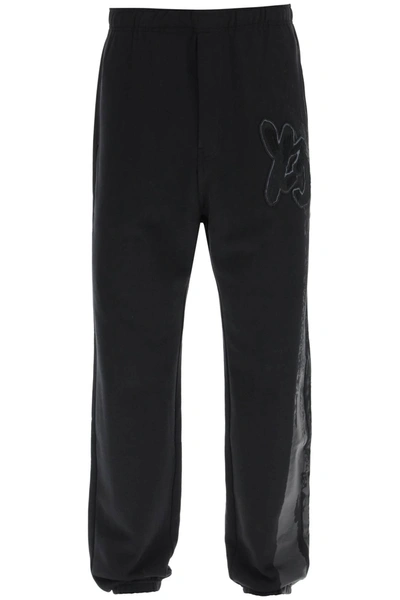 Shop Y-3 Jogger Pants With Coated Detail