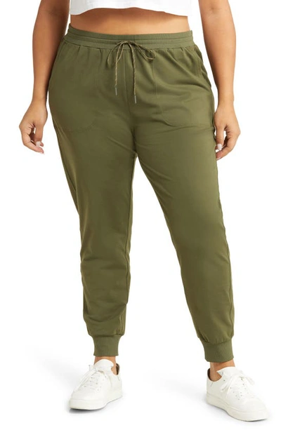 Shop Zella Live-in Pocket Joggers In Olive Night