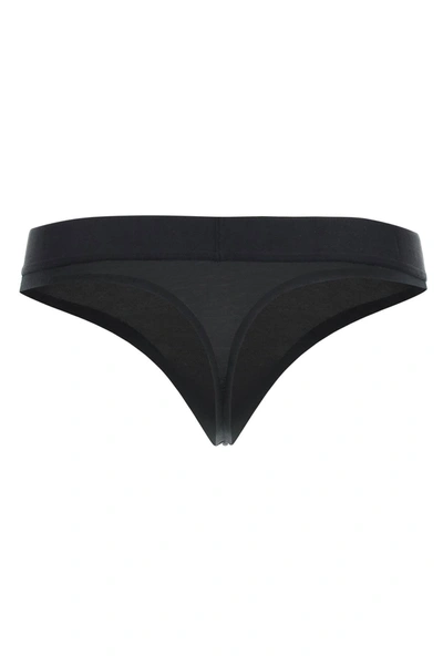 Shop Calvin Klein Underwear Embossed Icon Thong