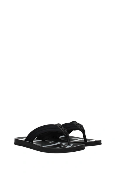 Shop Valentino Flip Flops Fabric Black