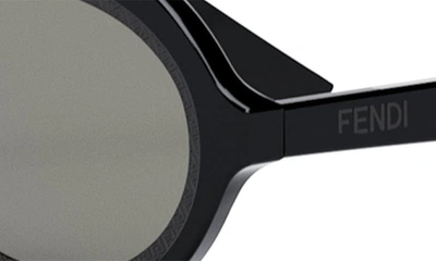 Shop Fendi The Ff  Around 52mm Oval Sunglasses In Shiny Black / Smoke