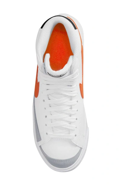 Shop Nike Kids' Blazer Mid '77 Vintage Sneaker In White/ Orange/ Grey/ Black