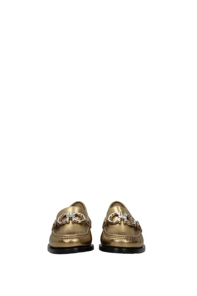 Shop Ferragamo Loafers Rolo Leather Gold