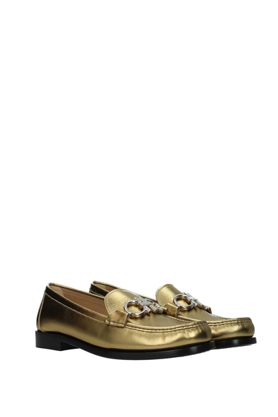 Shop Ferragamo Loafers Rolo Leather Gold