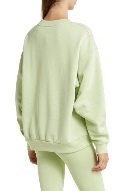 Shop Alo Yoga Accolade Crewneck Cotton Blend Sweatshirt In Iced Green Tea