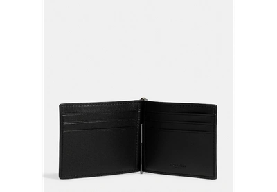 Shop Coach Outlet Slim Money Clip Billfold Wallet In Signature Canvas In Black