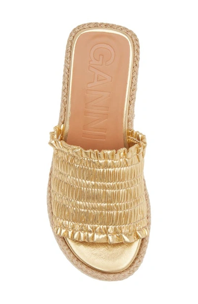 Shop Ganni Smocked Espadrille Platform Wedge Slide Sandal In Gold