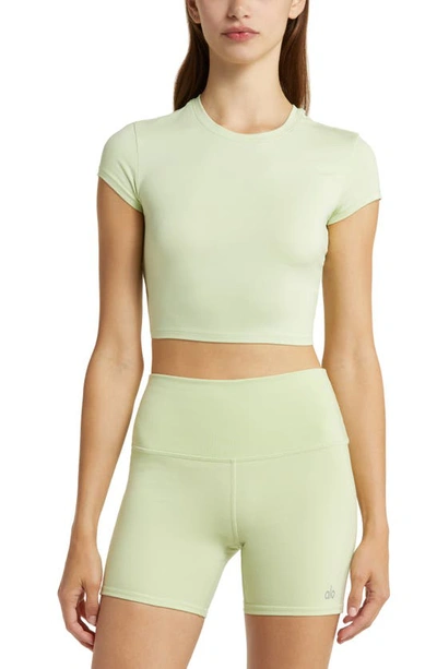 Shop Alo Yoga Adapt Alosoft Short Sleeve Crop Top In Iced Green Tea