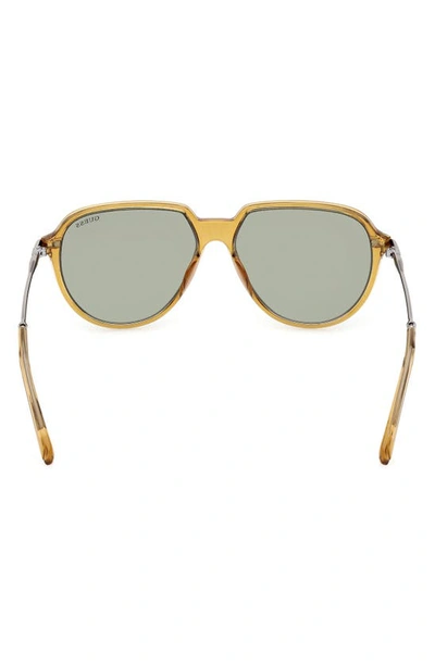 Shop Guess 56mm Aviator Sunglasses In Yellow / Green