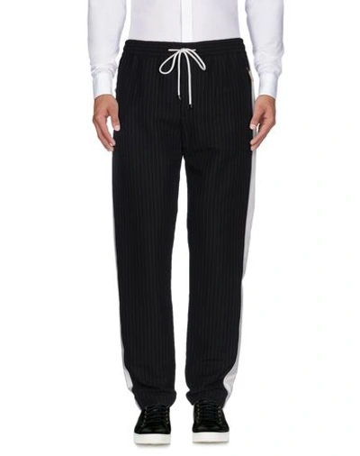 Dolce & Gabbana Pinstriped Drawstring Trousers In 0400088239646