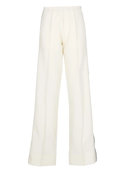 Shop Palm Angels Cotton Blend Trousers In Off White