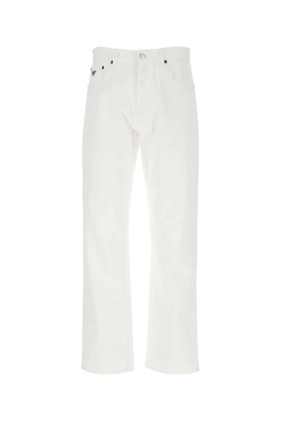 Shop Prada Logo-patch Denim Jeans In White