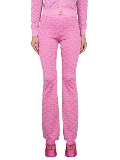 Shop Versace Jacquard Pants With Greek Print In Rosa