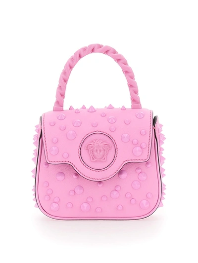 Shop Versace Mini Pointed Studded Bag The Medusa In Rosa